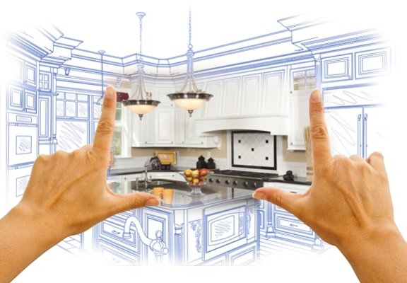 36951394 - female hands framing custom kitchen design drawing and photo combination.